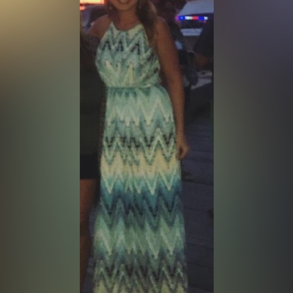Kenzie size 6 maxi dress with bright Aztec print and yellow stitch detail.